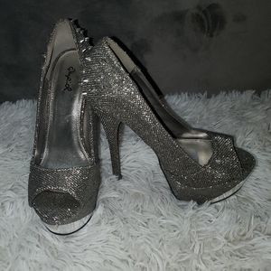 Silver spiked high heels